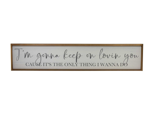 "I'm gonna keep on loving you..." - Sign